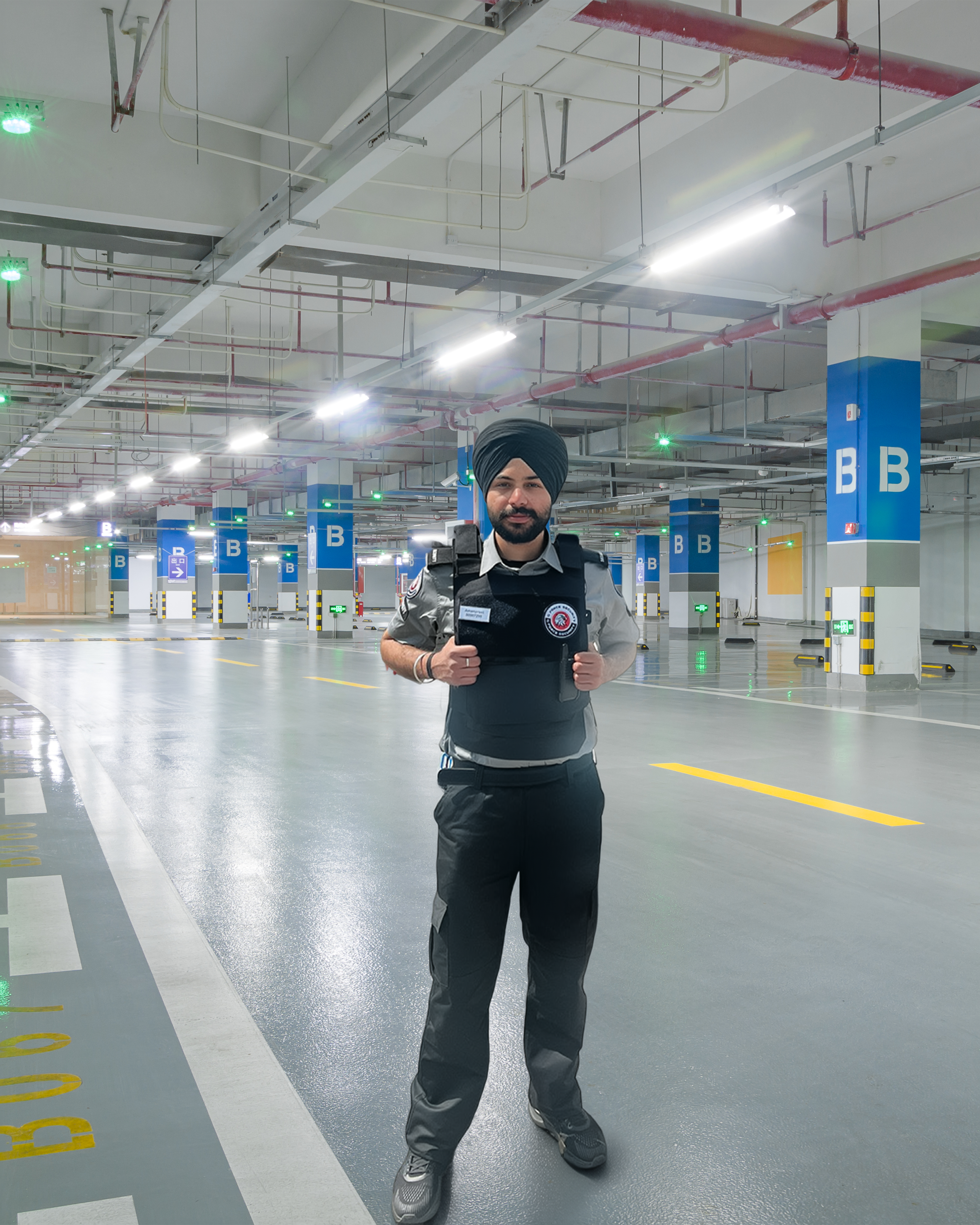 Security guard on patrol in an underground parking garage